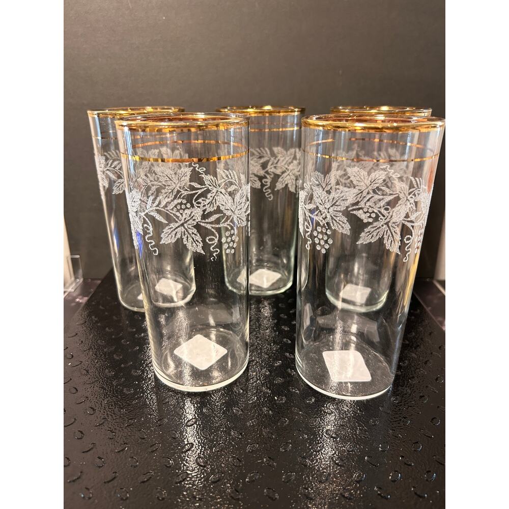 Five Bartlett Collins tumblers with white etched grape and leaf with a gold rim